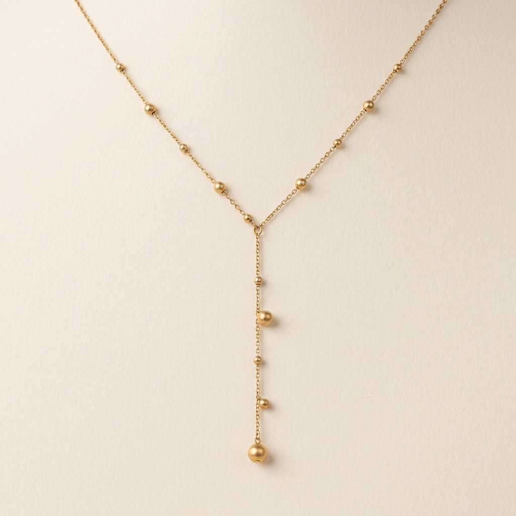 Elegant Y‑Drop Gold Bead Necklace